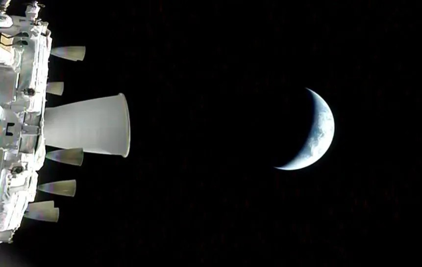 NASA Orion Integrity spacecraft Artemis II with Earth in background