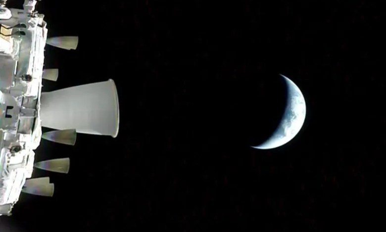 NASA Orion Integrity spacecraft Artemis II with Earth in background