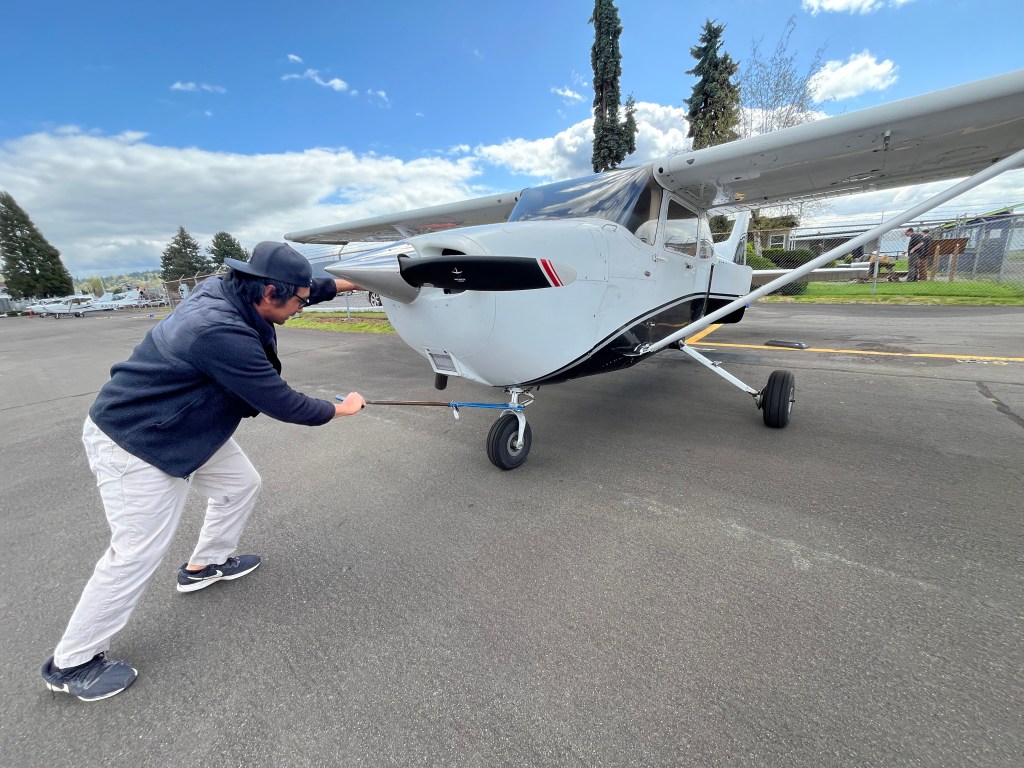Learning how to use a tow bar is an important (and early) part of a pilot's  training. [Credit: Meg Godlewski]