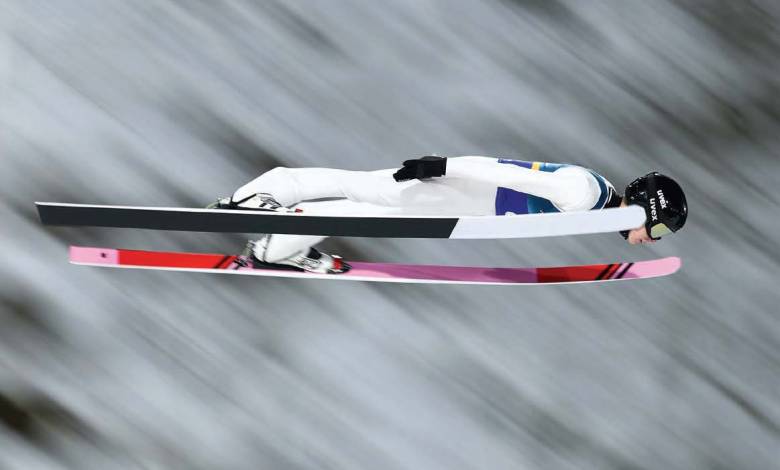Flight time may possibly be more affected by the rate at which ski jumpers slow down than by the rate at which they lose height. [Credit: U.S. Ski & Snowboard]