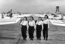 Women Airforce Service Pilots walk among North American AT-6 aircraft at an American base during World War II. [Credit: Public Domain/Museum of Flight]