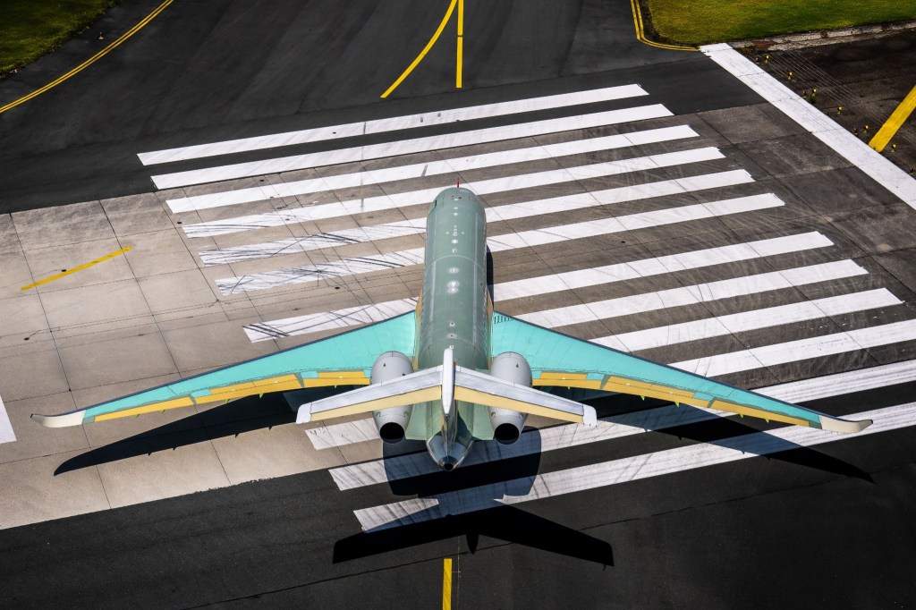 Dassault Falcon 10X business jet aerial shot on runway