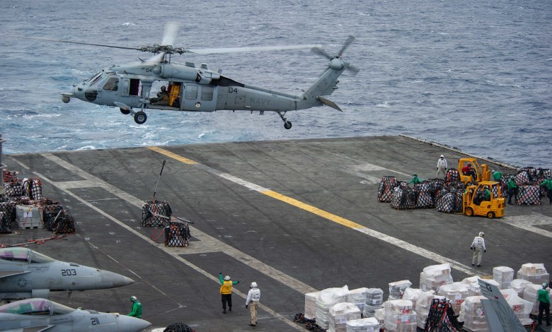 U.S. Navy Sikorsky MH-60S Seahawk helicopter landing on aircraft carrier