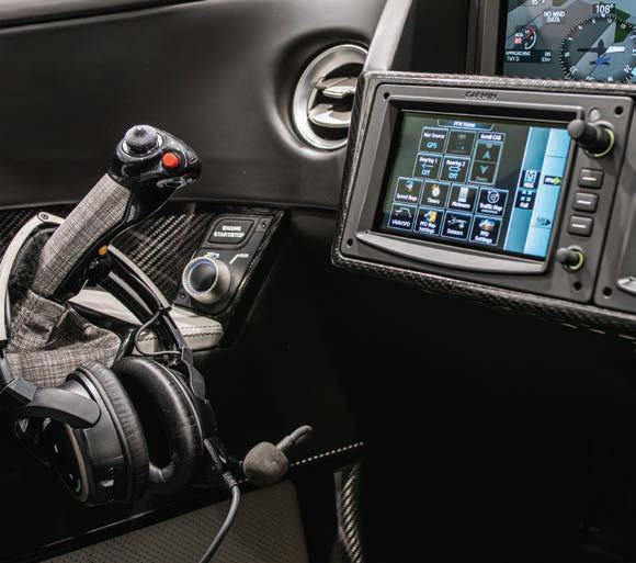 Pilot’s side stick and CPDLC panel on the Cirrus SF50 G3 Vision Jet [Credit: Erin Armstrong]