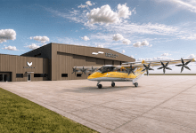 Electra EL9 Ultra Short hybrid-electric aircraft in front of Signature Aviation FBO terminal and UrbanV vertiport
