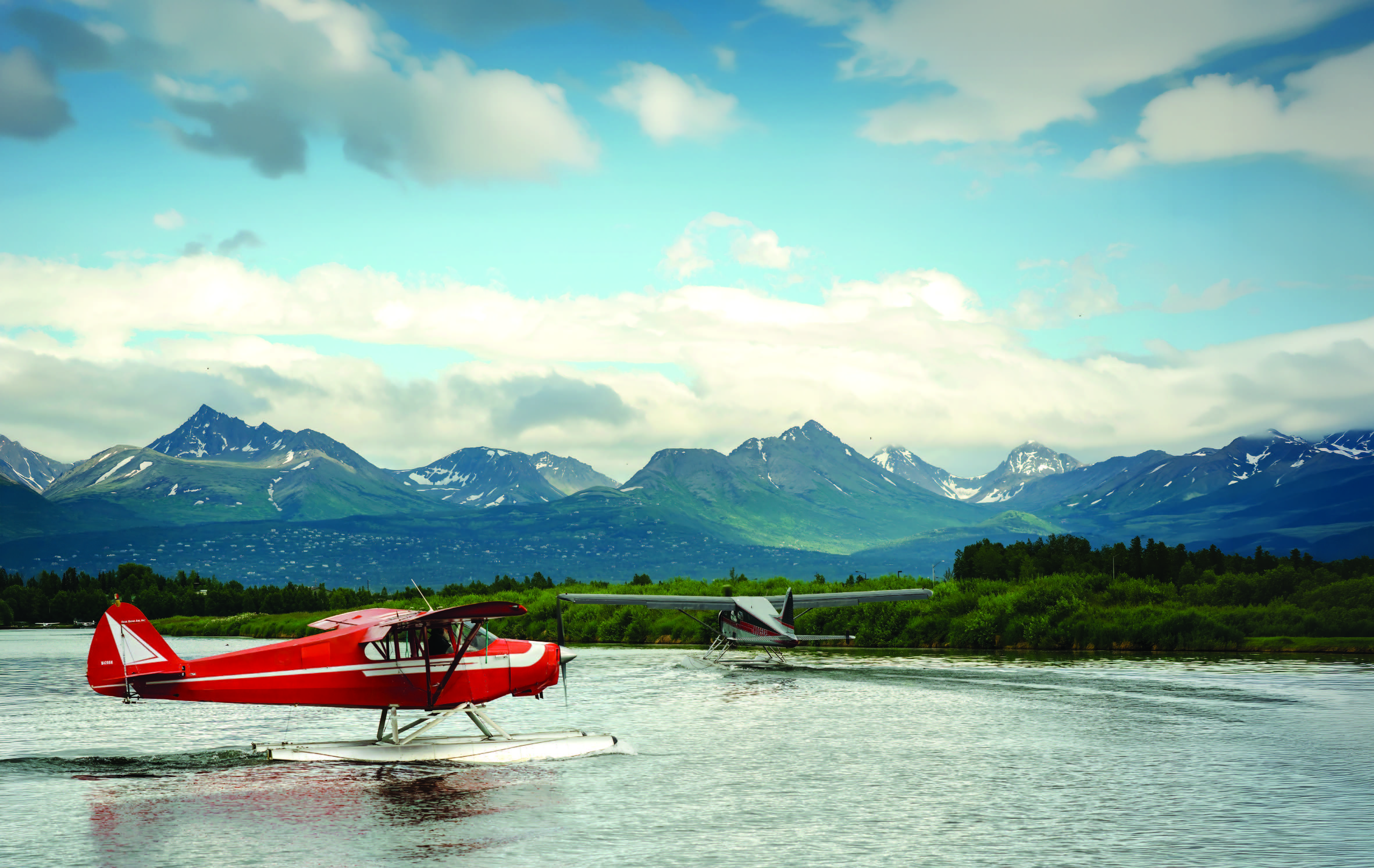 Lake Hood Seaplane Base in Alaska is both the largest and busiest facility of its kind in the world. [Credit: Adobe Stock]