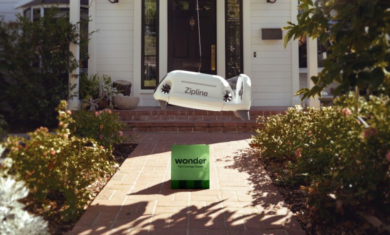 Zipline delivery drone lowering a droid and package from Wonder on a tether