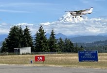 Airplane on approach at Pierce County Airport-Thun Field in South Hill, Washington. [Credit: Meg Godlewski]