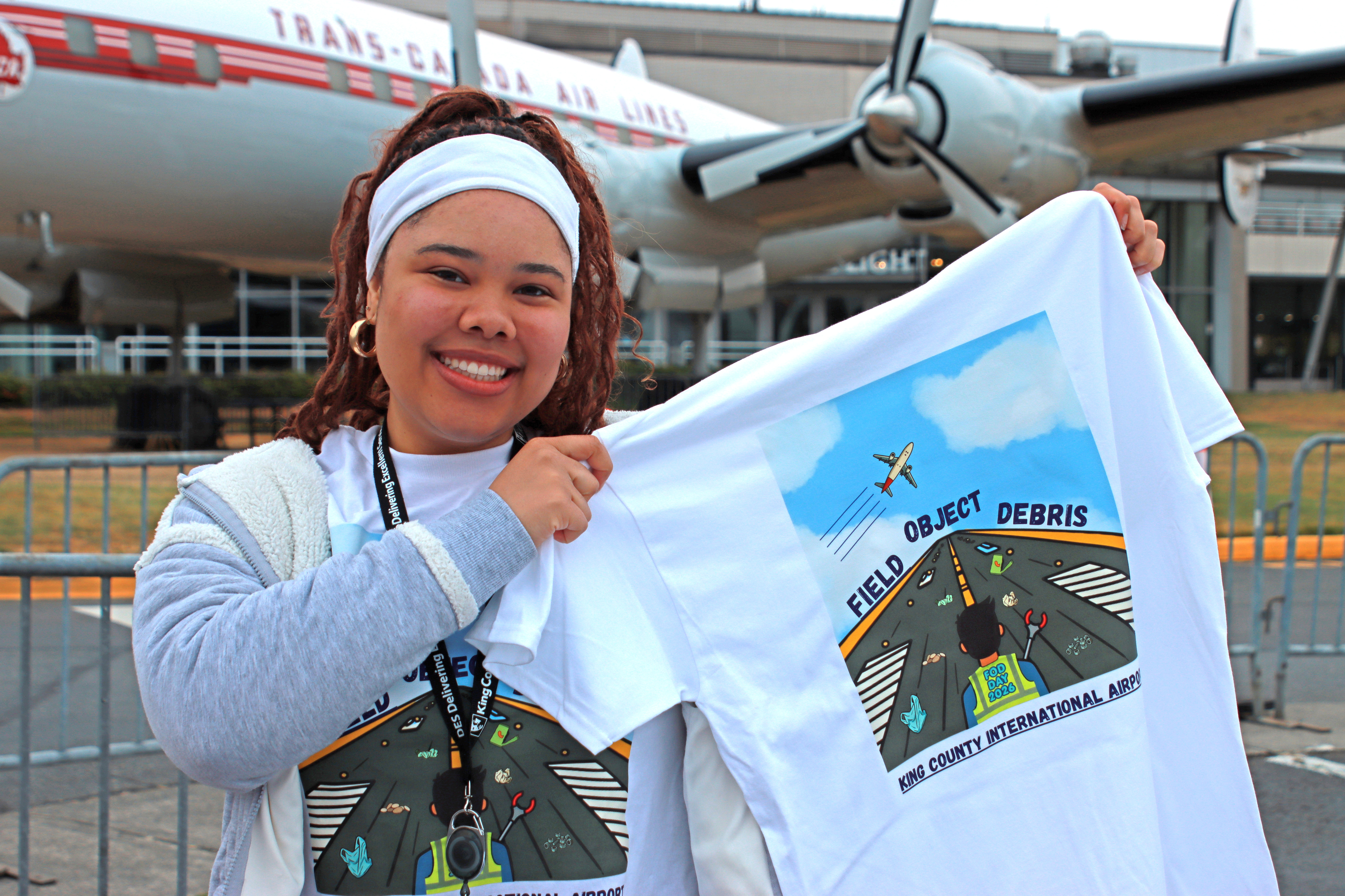 Chauncey Jones designed the T-shirt art for the semiannual Boeing Field FOD Day 2026. [Credit: King County International Airport]