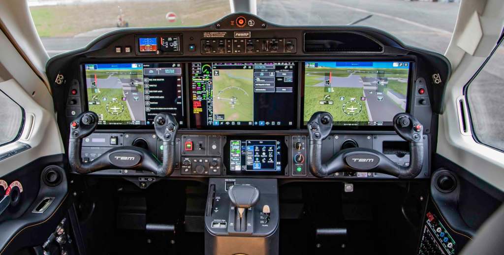 Garmin G3000 Prime avionics set the TBM 980 apart. Three 14-inch screens make relevant information readily accessible. [Credit: Daher Aircraft]