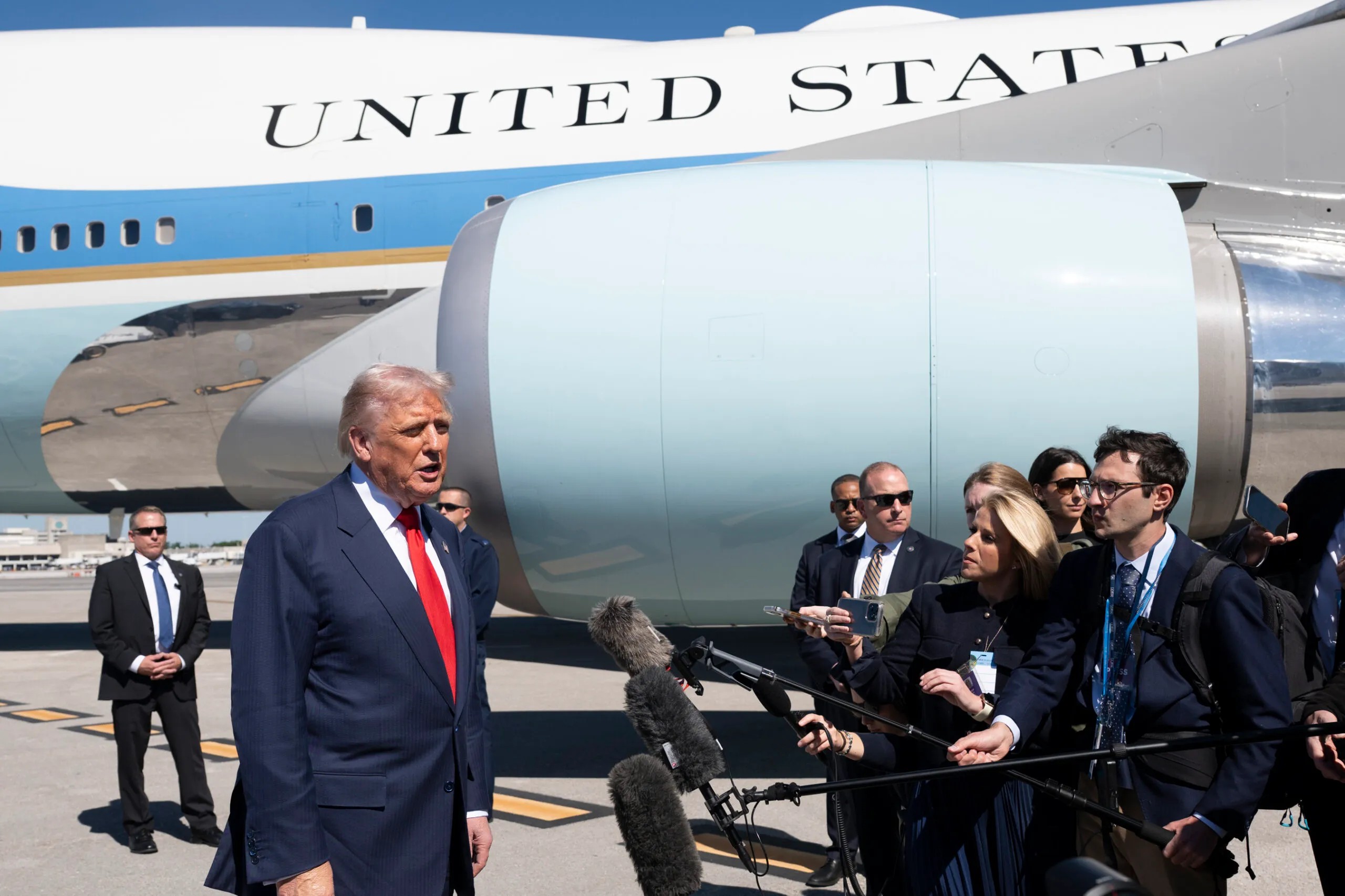 President Donald Trump disembarks Air Force One