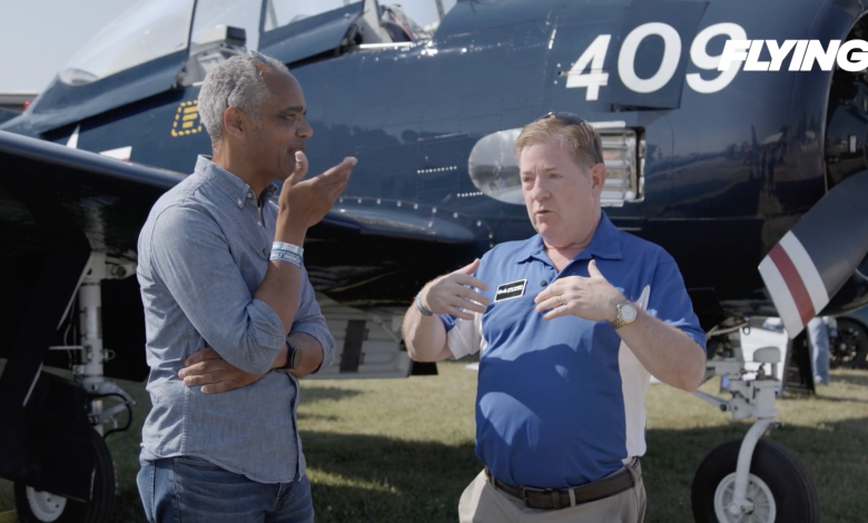 The Aviation Consumer’s Jonathan Welsh (left) talks with Chris D'Acosta, CEO of Swift Fuels, at EAA AirVenture in July. [Credit: FLYING]