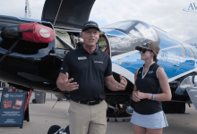 Plane + Pilot magazine’s Cayla McLeod (right) talks with Edwin Black (left), president of Blackhawk Aerospace, at EAA AirVenture in July. [Credit: AVweb]
