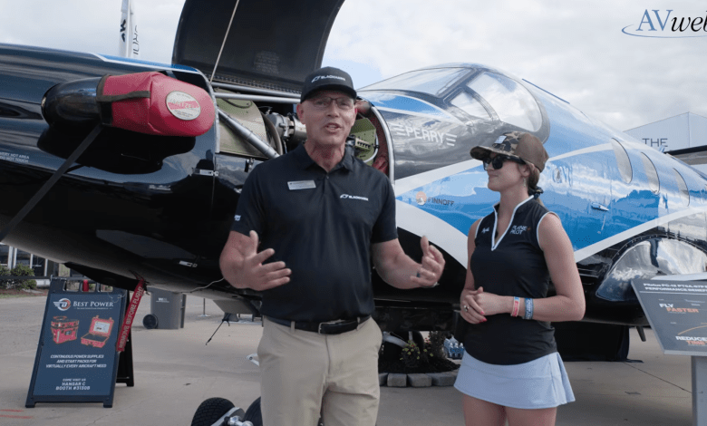 Plane + Pilot magazine’s Cayla McLeod (right) talks with Edwin Black (left), president of Blackhawk Aerospace, at EAA AirVenture in July. [Credit: AVweb]
