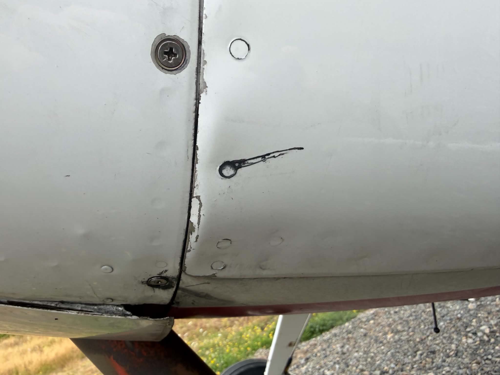 ‘Smoking rivet’ on the belly of a Cessna 180 [Credit: Mike Beckett]
