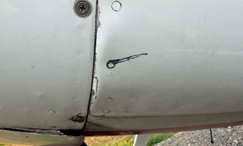 ‘Smoking rivet’ on the belly of a Cessna 180 [Credit: Mike Beckett]