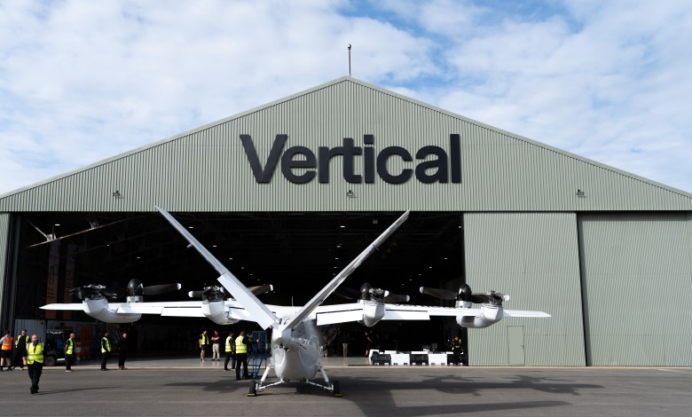 Vertical Aerospace air taxi assembly center at Cotswold Airport with prototype Valo aircraft standing in front