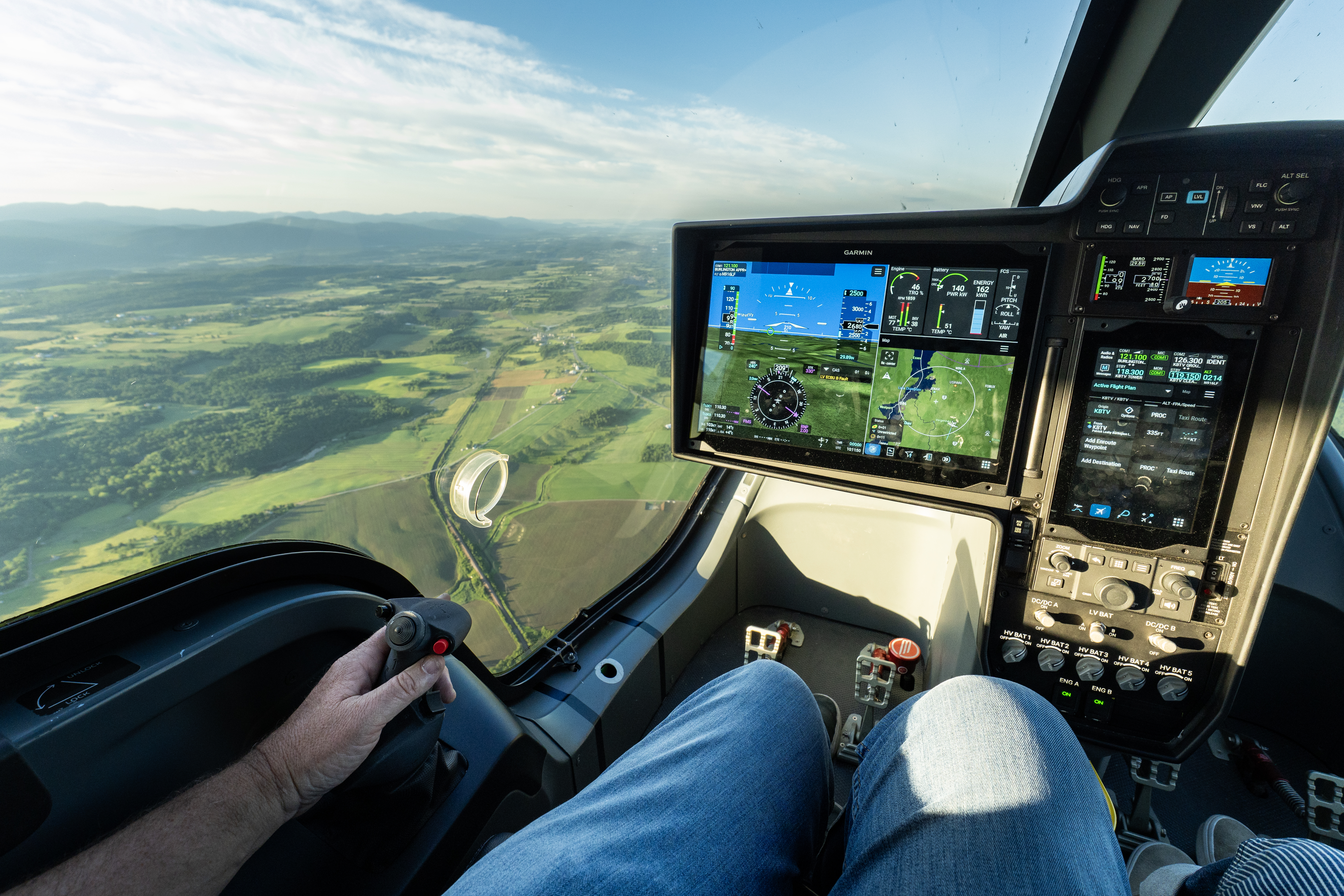 Beta’s all-electric Alia CX300 features a streamlined cockpit with touchscreen displays and intuitive joystick controls. [Credit: Beta Technologies]