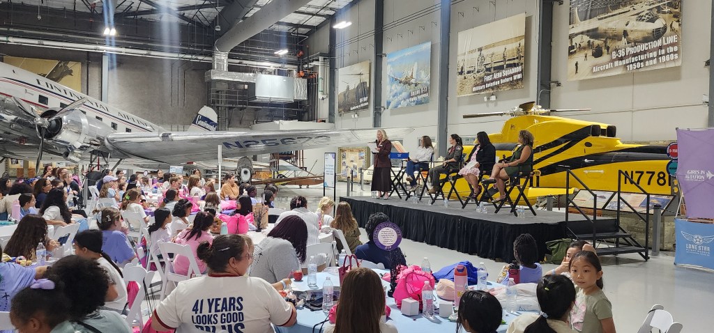 Panelists speak at Houston’s Lone Star Flight Museum during the 12th annual Girls in Aviation Day on Saturday, September 19. [Credit: Lone Star Flight Museum]