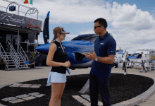 Plane + Pilot magazine’s Cayla McLeod (left) talks with Tecnam’s managing director, Giovanni Pascale in July. [Credit: FLYING]