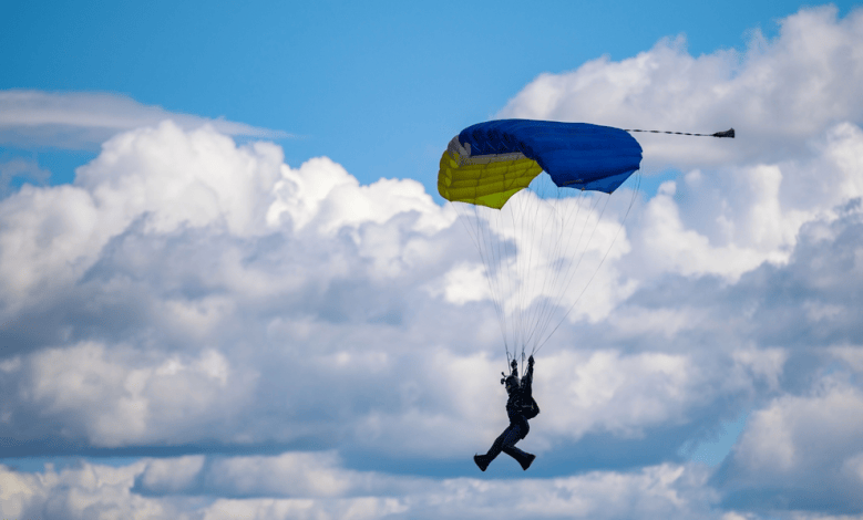 Skydiver with parachute deployed [Credit: Shutterstock]