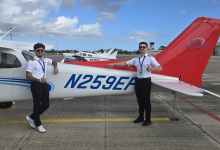Shemuel Ortiz (left), who won a $20,000 pilot scholarship from Epic Flight Academy in 2023, poses with instructor Kyle Mooney after passing the CSEL in June 2026. [Credit: Epic Flight Academy]