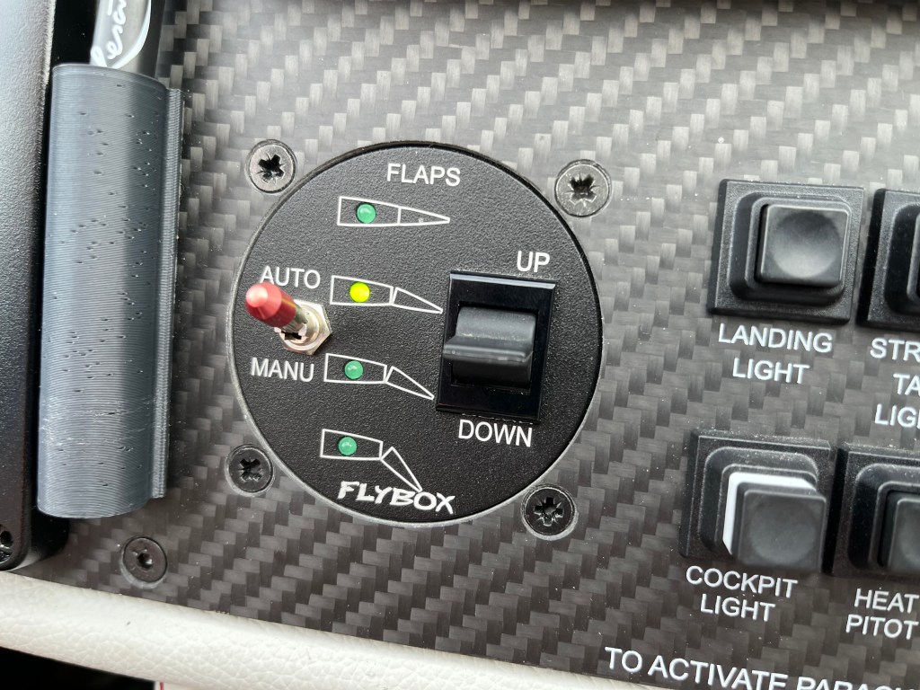 The centrally located flap indicator (right) uses simple pictograms to clearly display flap position at a glance. [Credit Meg Godlewski]