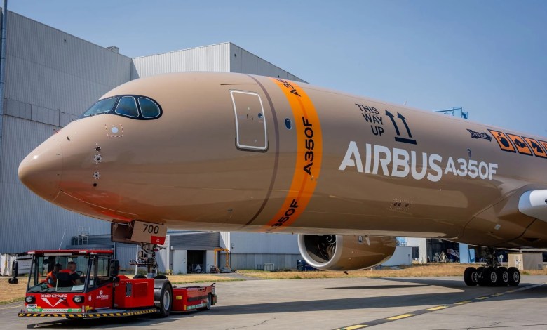 Airbus A350F test aircraft rolls off assembly line before maiden flight