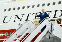 President Donald Trump disembarks Air Force One