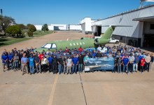 Textron Aviation employees celebrate the first Cessna Citation CJ4 Gen3 production unit rolling out of its facilities in Wichita, Kansas