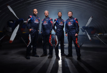 Red Bull Aerobatic Team pilots posing in front of XA42 XtremeAir aircraft