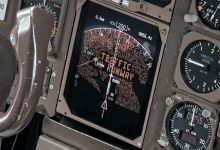 Cockpit display with warning indicating traffic on runway