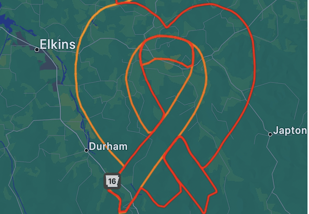Benjamin Glasgow McDaniel III, the self-named ‘Pilot Picasso,’ builds hours and creates artwork in the sky. Above is his breast cancer awareness ribbon. [Credit: Benjamin Glasgow McDaniel III]