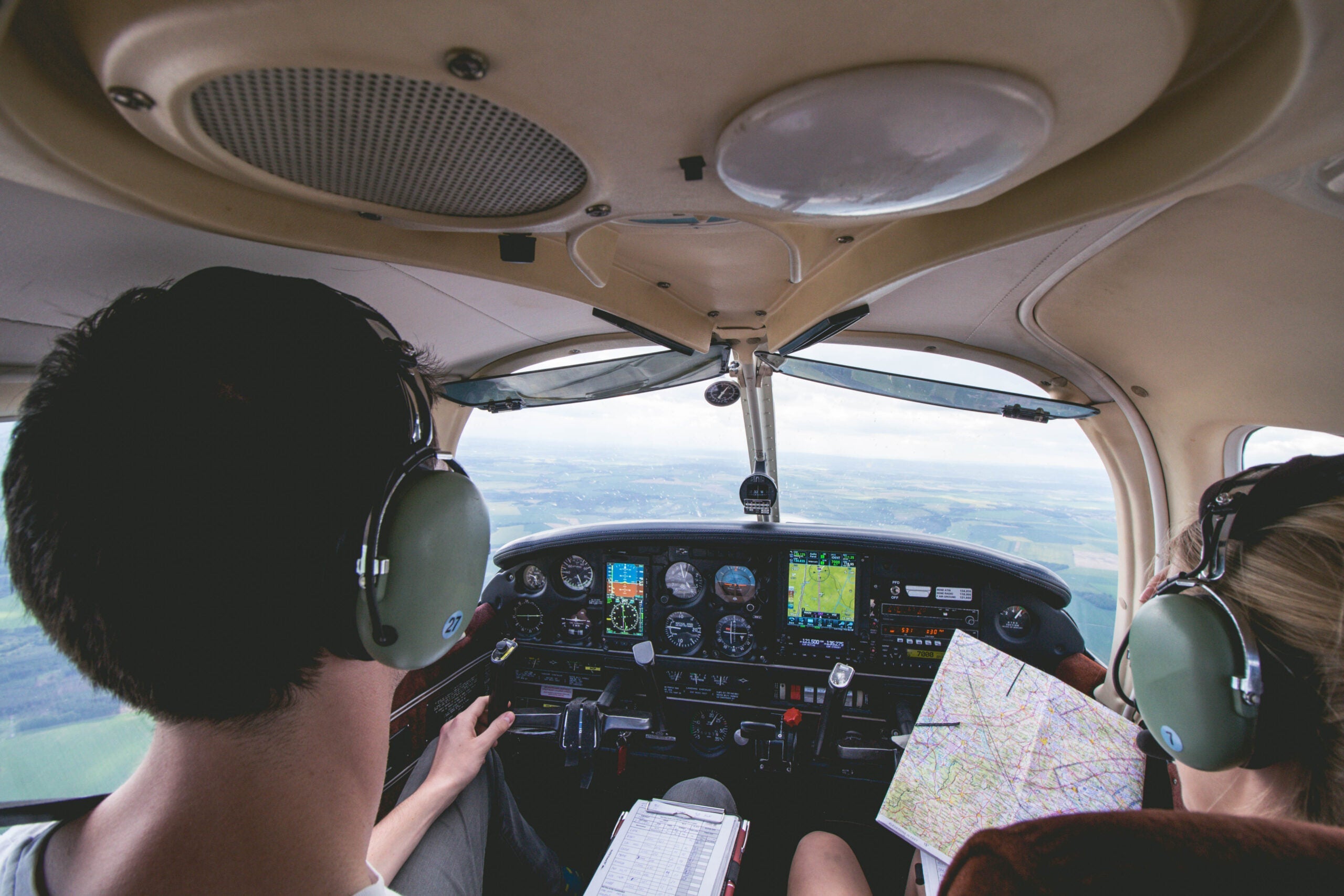 Pilots in the cockpit. [Credit: Shutterstock]