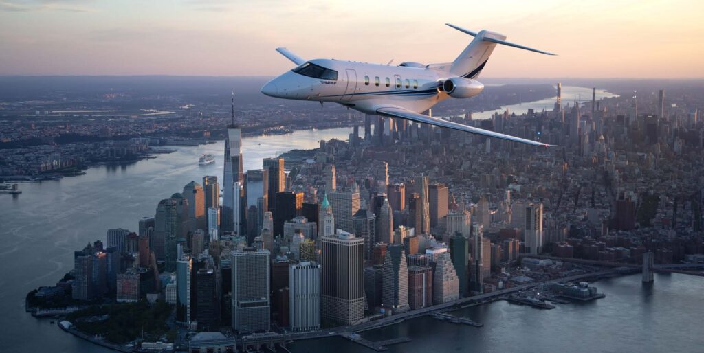 The Pilatus PC-24 owned and flown by ‘Gumby’ flies near New York City. [Credit: Jessica Ambats]