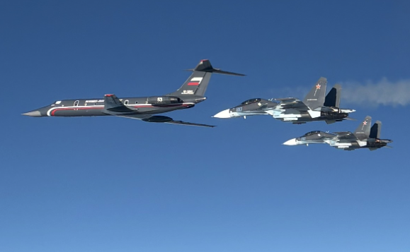 A Russian Tu-134UBL nicknamed "Black Pearl" by Western security experts, at left.