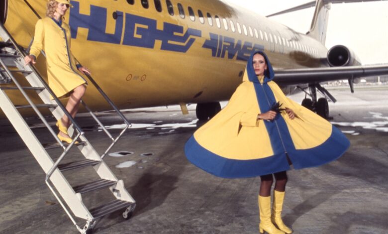 Marge Marques (left) and Zonia Arauzo (model Hughes Airwest flight attendant uniforms for a promotional photo shoot in 1987. [Credit: Museum of Flight]